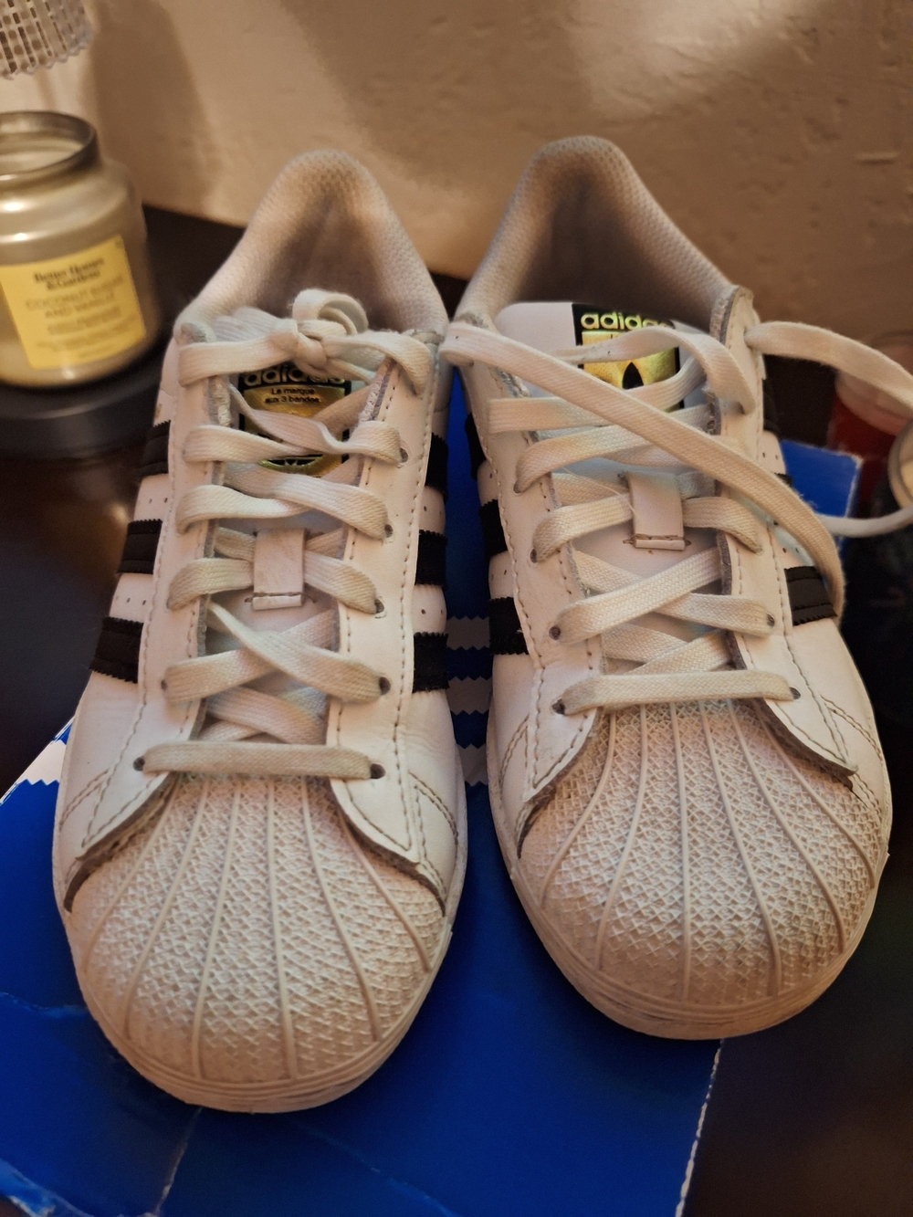 adidas Kids White Sneakers with Black Stripes and Gold Tongue Accent